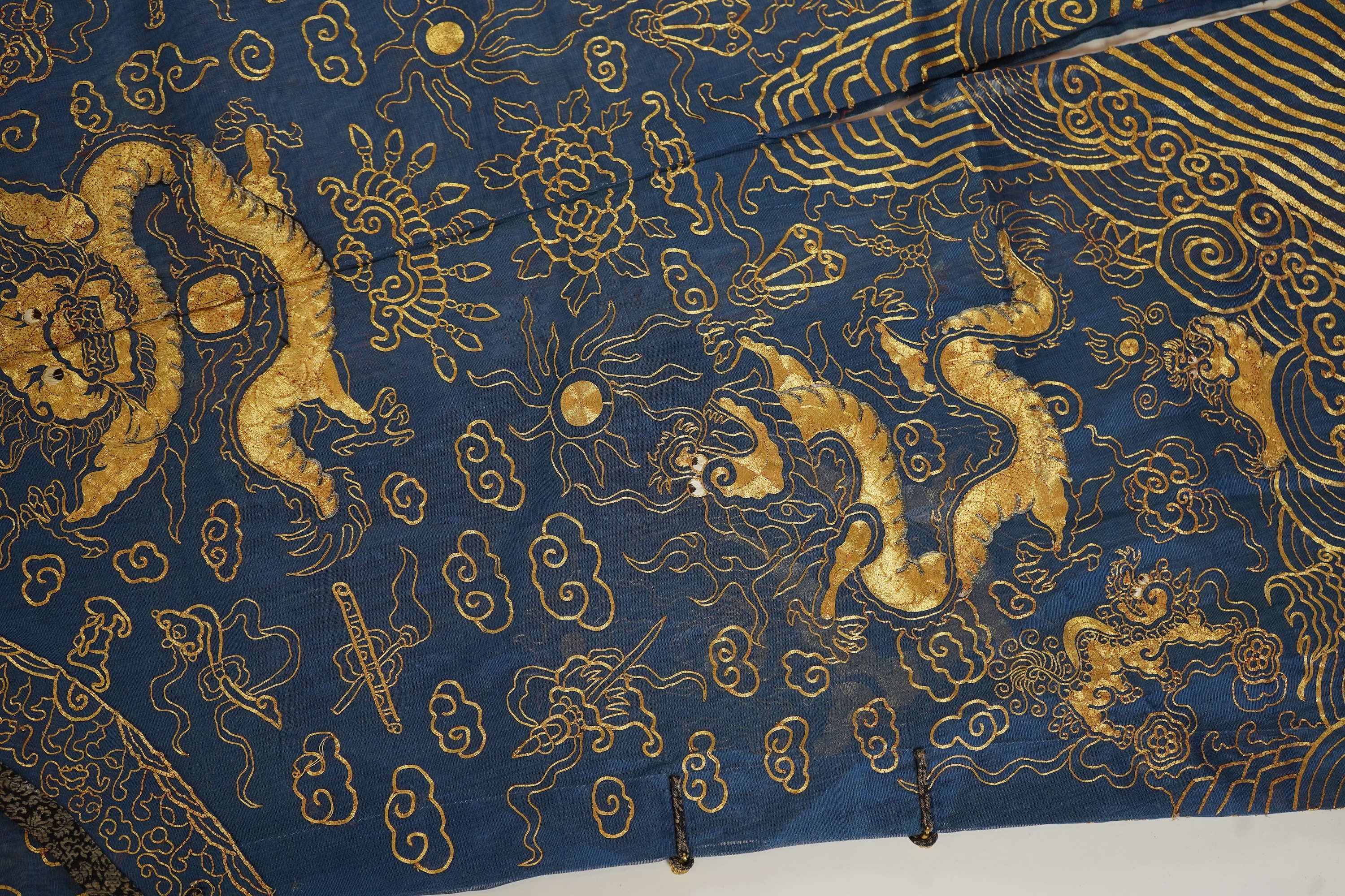 A Chinese gold thread and silk gauze ‘dragon’ summer robe, jifu, early 20th century